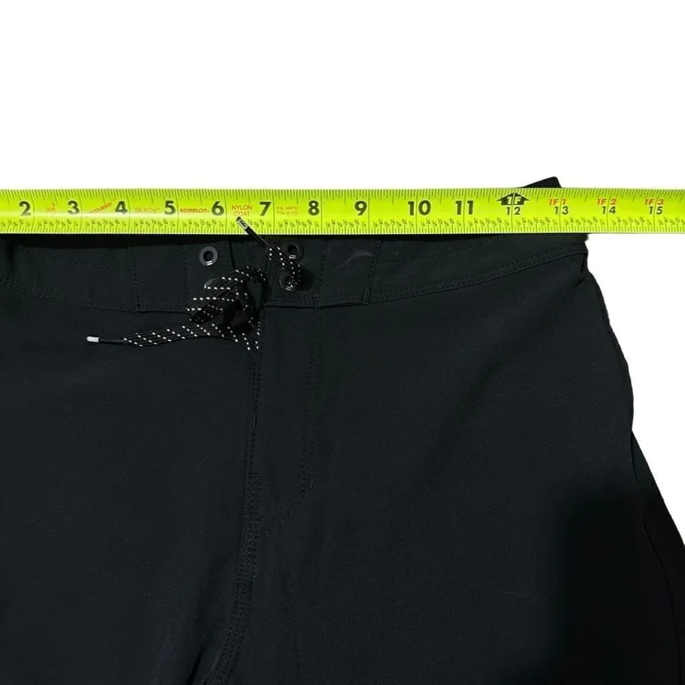 Billabong black shorts size 25.  A454